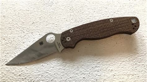 Blade has some scratches from sharpening and use. . Spyderco k390 pm2